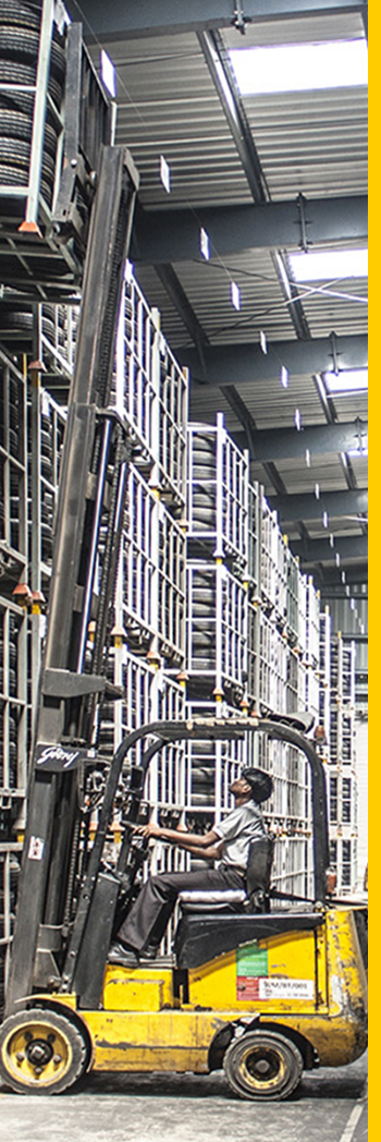 Operator performing industrial floor cleaning