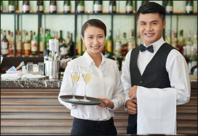Hospitality staff in restaurant and hotel roles